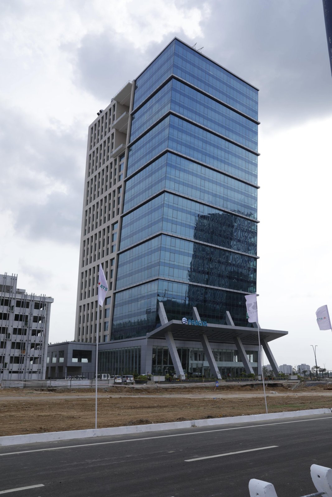 ATS Pragya glass facade seen from the GIFT City road